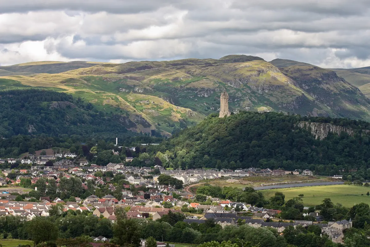 Wallace Monument on Abbey Craig above Stirling and the green hills behind