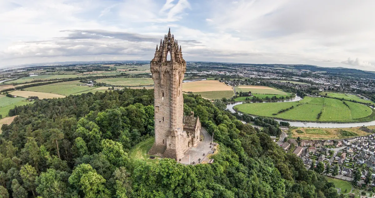 Aerial view of the Wallace Monument with the looping River Forth and farmland